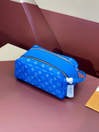 Louis Vuitton blue monogram crossbody bag with zip closure and side strap