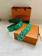 Louis Vuitton green monogram belt with LV buckle on folded canvas pouch