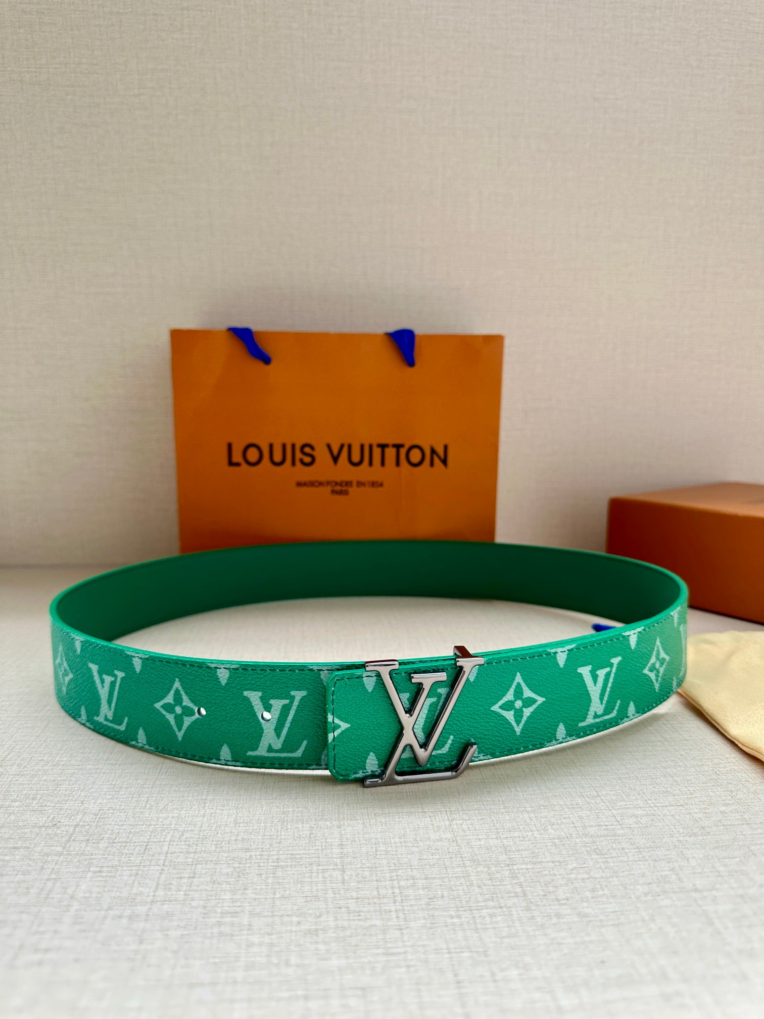 Louis Vuitton green monogram belt with gold-tone buckle