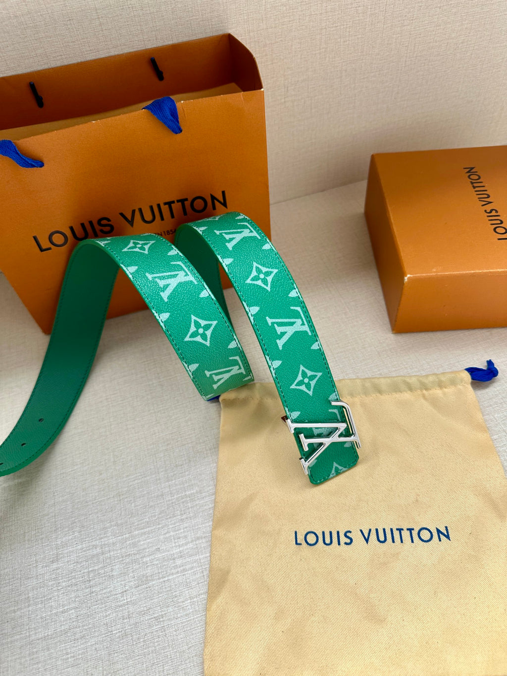Louis Vuitton green monogram belt with LV buckle and canvas dust bag