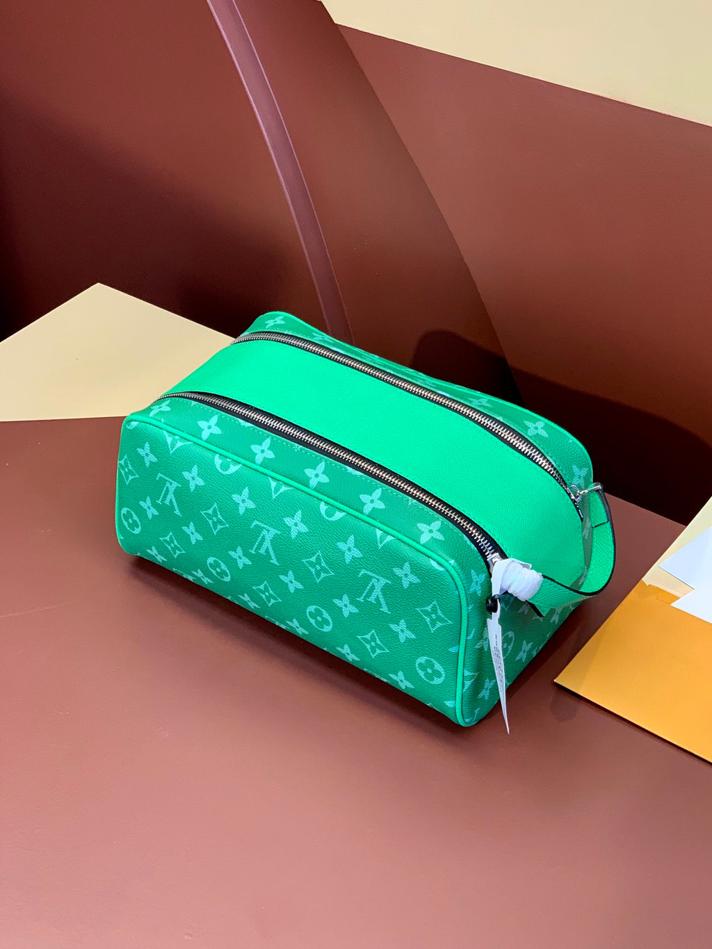 Louis Vuitton monogram belt bag, green with front zip pocket and curved handle