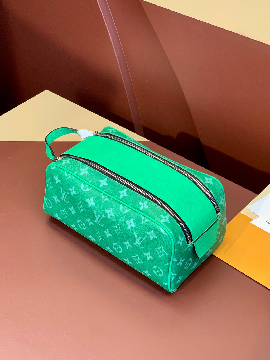 Louis Vuitton monogram belt bag in bright green with dual zip compartments