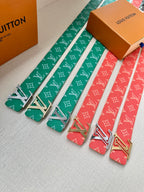 Set of patterned belts with silver buckles: green and red straps