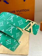 Green logo belt with gold-tone LV buckle and patterned strap end