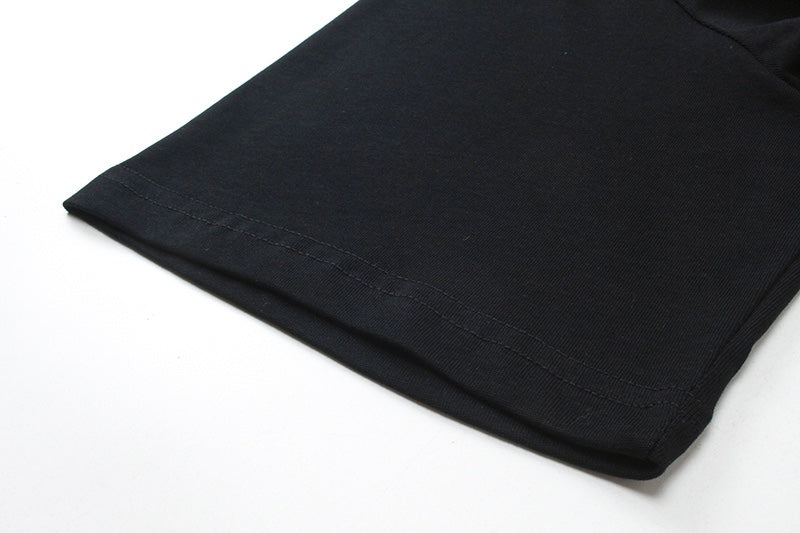 Gucci black T-shirt hem detail with visible stitching