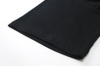 Gucci black T-shirt hem detail with visible stitching