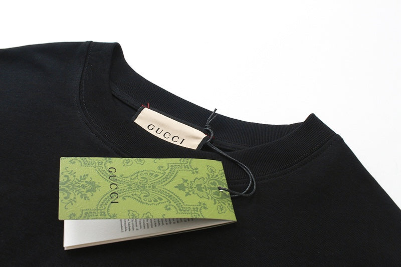 Gucci T-shirt neckline with brand label tag at the collar