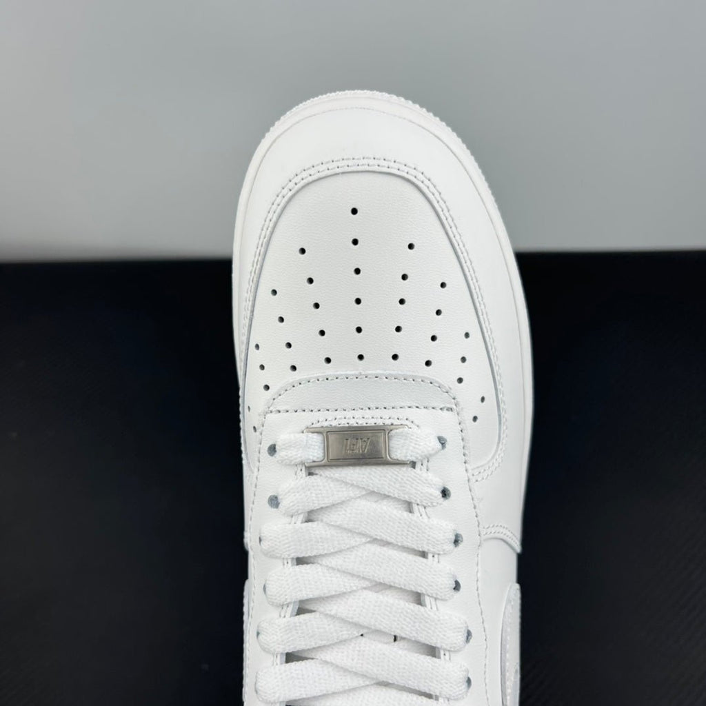 White Nike Air Force 1 toe box with perforations and lace-up front
