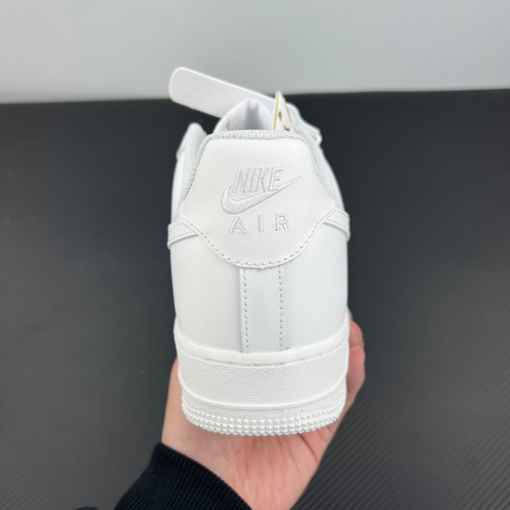 White Nike Air Force 1 heel cap, lace-up back with Nike Air branding