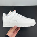 White Nike Air Force 1 low-top sneaker, lace-up with Swoosh on side