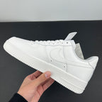 White Nike Air Force 1 low-top sneaker, side profile with lace-up and Swoosh