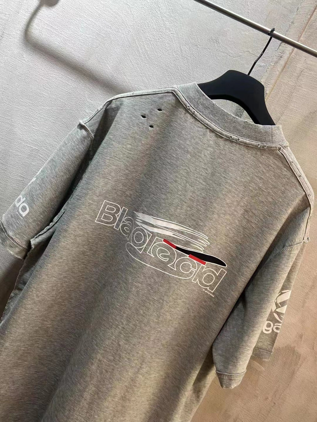 Light gray T-shirt with back graphic logo print and crew neckline
