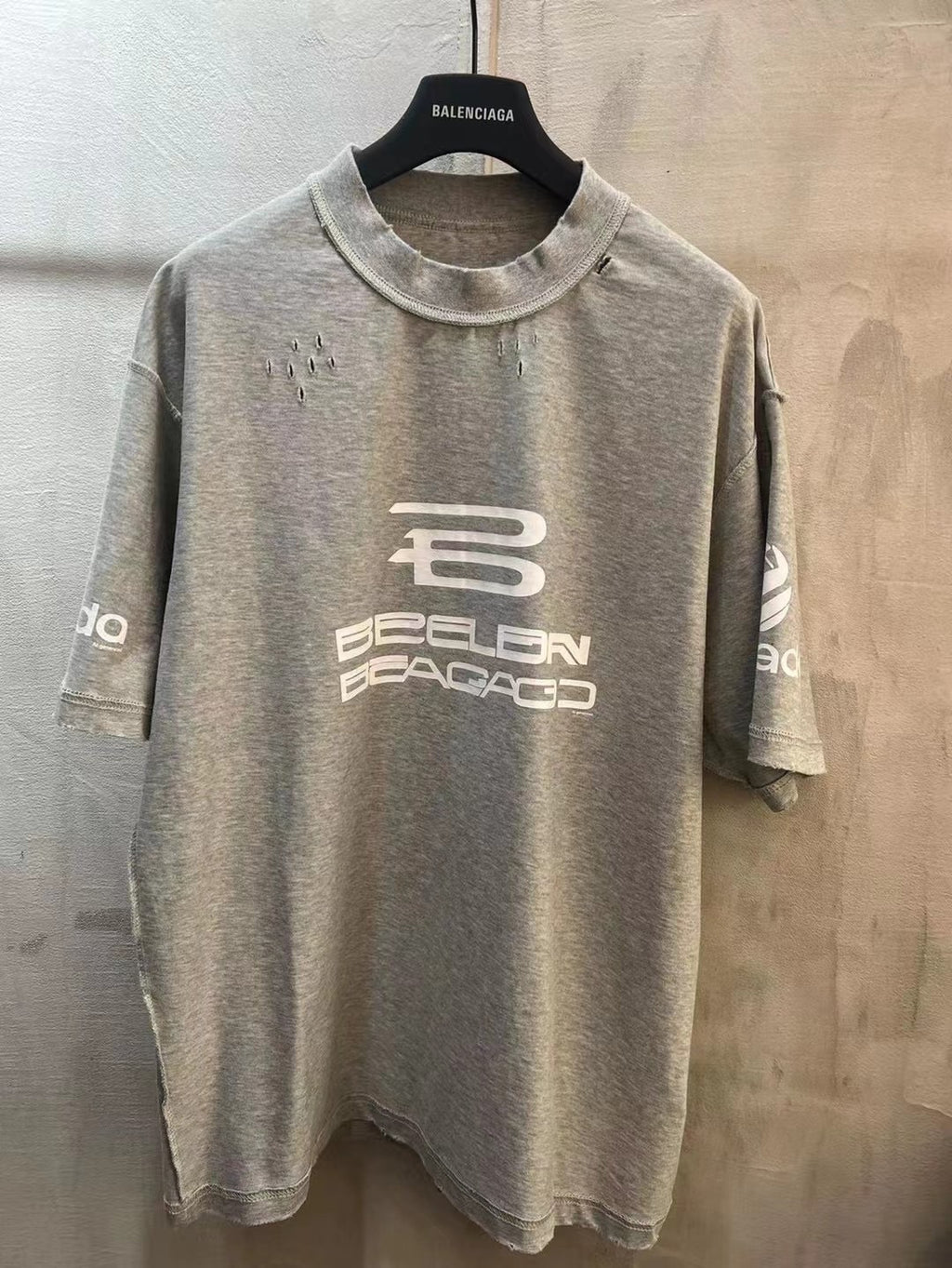 Light gray Balenciaga T-shirt with large front graphic print and crew neckline