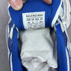 Balenciaga size label inside blue tongue on white and blue chunky sneakers