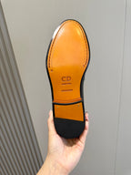 Dior unisex loafer outsole, amber leather with CD and Goodyear marks