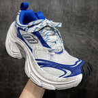 Unisex chunky sneaker in white and blue with padded blue collar and lace-up