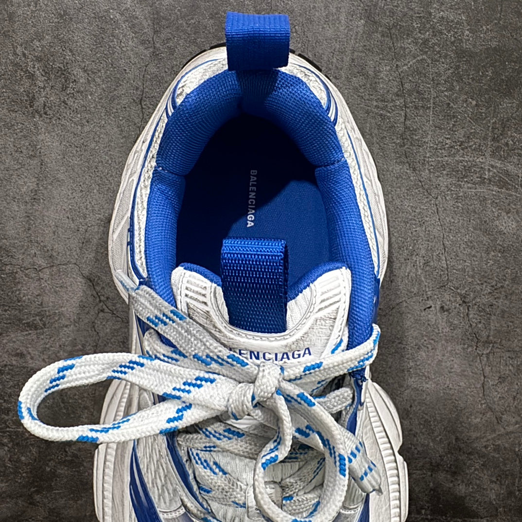 Unisex sneaker interior showing blue insole and Balenciaga logo on heel