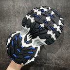 Unisex chunky sneaker outsole in black with blue and white traction pods