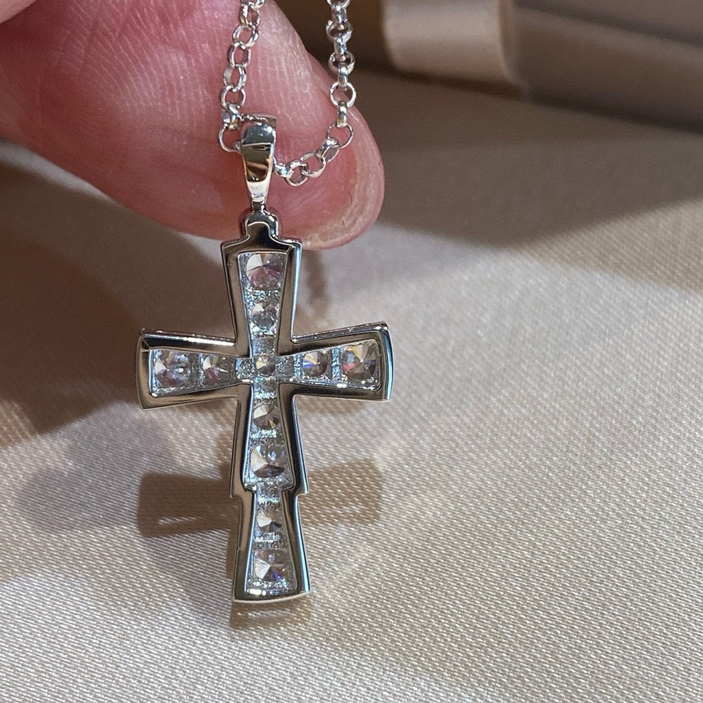 Bvlgari silver-tone cross pendant with clear pavé stones on a chain