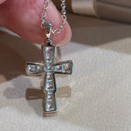 Bvlgari silver-tone cross pendant with clear pavé stones on a chain