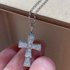 Bvlgari silver-tone cross pendant with clear pavé stones on a chain