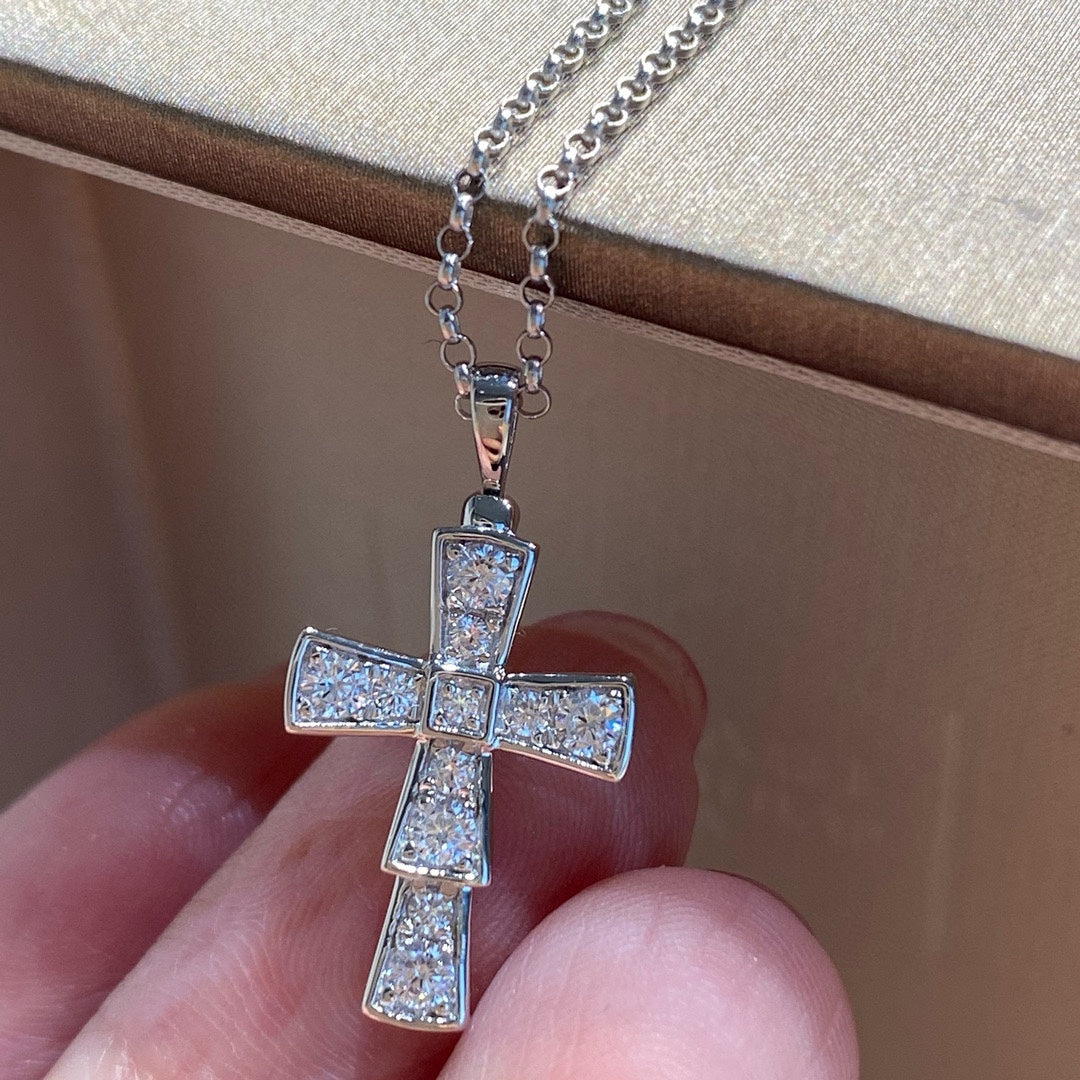 Bvlgari silver-tone cross pendant with clear pavé stones on a chain