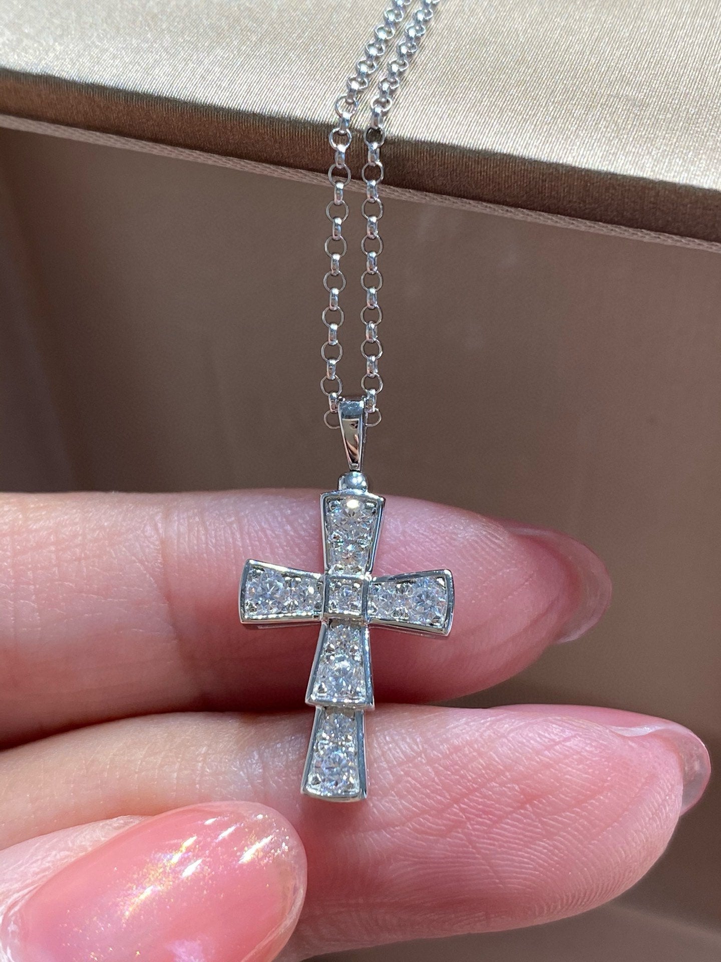 Bvlgari silver-tone cross pendant with clear pavé stones on a fine chain