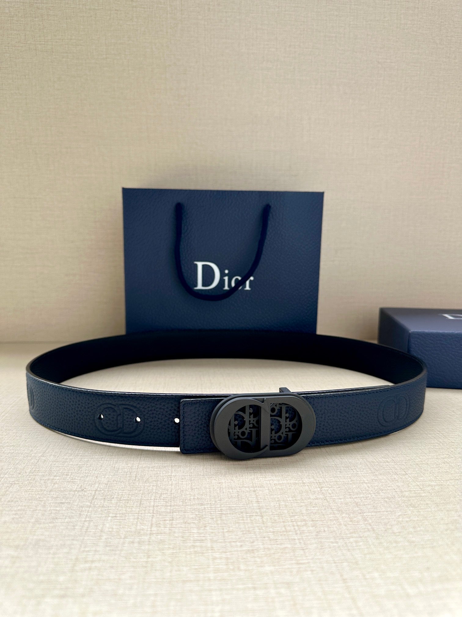 Dior belt in dark blue leather with oval logo buckle