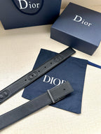 Dior belt with metal buckle, embossed logo, and leather strap eyelets