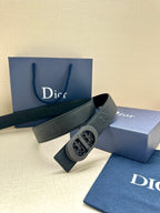Dior belt with embossed texture, oval buckle, and adjustable belt holes