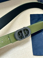 Green grained leather Dior belt with oval logo buckle close-up