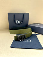 Green leather Dior belt with oval logo buckle and dark edge lining