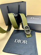 Green leather Dior belt with oval logo buckle and adjustable end tabs