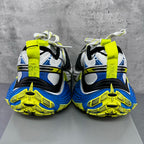 Back view of silver sneakers with blue and neon yellow accents, lace-up