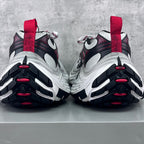 Balenciaga unisex sneakers rear view with red heel tabs and chunky white sole