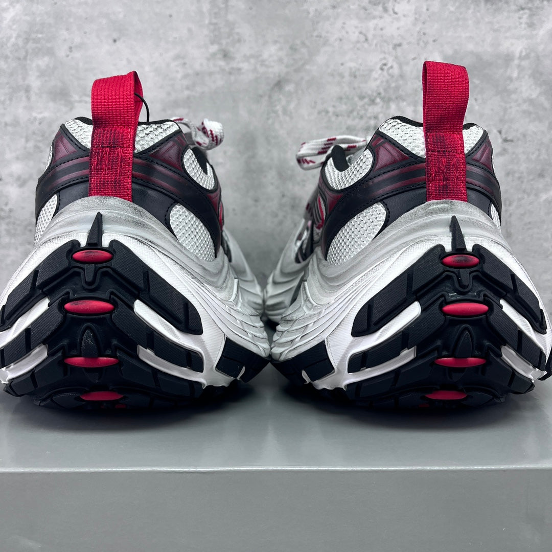 Balenciaga unisex sneakers rear view with red heel tabs and chunky white sole