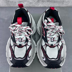 Balenciaga unisex sneakers front view, white mesh with black overlays and red laces