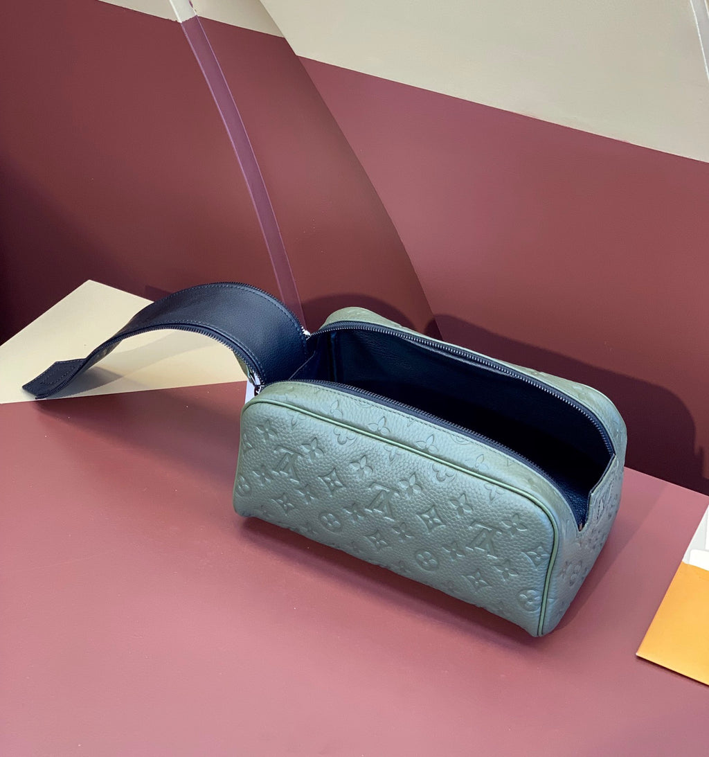 Louis Vuitton monogram zip pouch, light blue, open top with dark interior