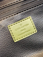 Louis Vuitton rectangular label on textured leather zip pouch in dark gray