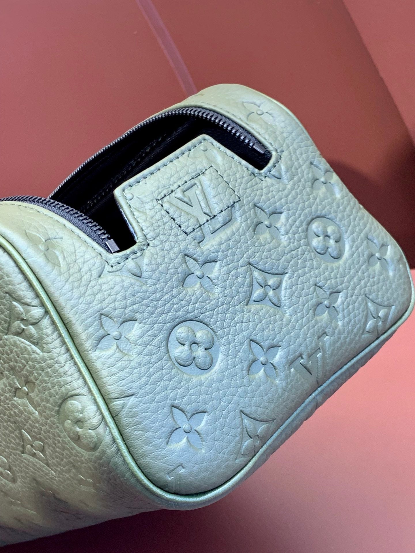 Louis Vuitton monogram zip pouch, light blue with embossed floral pattern