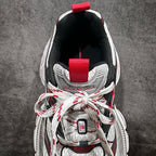 Balenciaga sneakers, heel and laces: red pull tab, black interior, red/white details