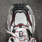 Balenciaga chunky sneakers, tongue and lacing close-up: red and white laces