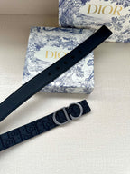 Dior belt strap with dark navy leather, visible eyelets and silver-tone CD buckle.