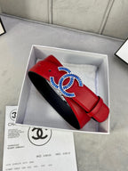 Chanel belt red strap with black underside, displayed in box with papers