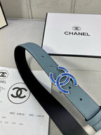 Chanel belt in light blue with CC buckle and belt holes visible