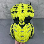 Chunky sneaker outsole with neon yellow tread pattern over black rubber