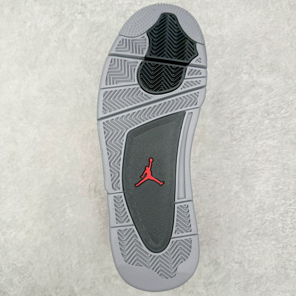Grey rubber outsole with red Jumpman logo and textured herringbone traction