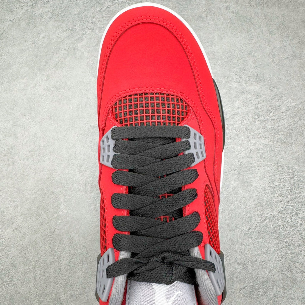 Red sneaker upper close-up with black laces and mesh forefoot panel
