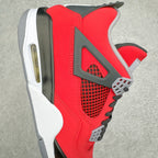 Red sneaker side view with gray wing detail, black mesh, and visible air sole unit