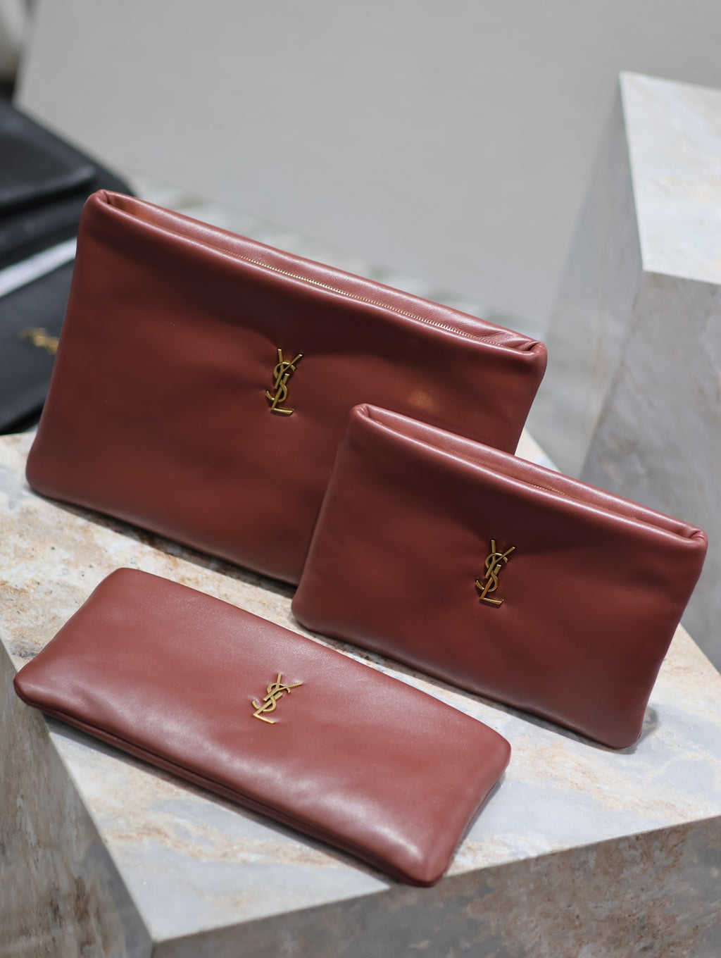 Burgundy leather clutch with gold YSL logo, two-piece small bag set